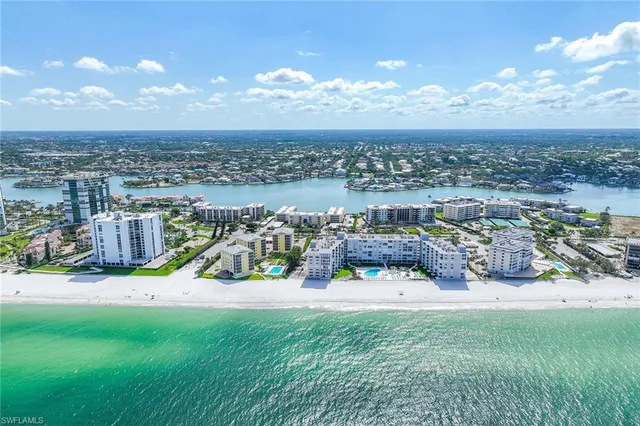 a view of a lake with a yard