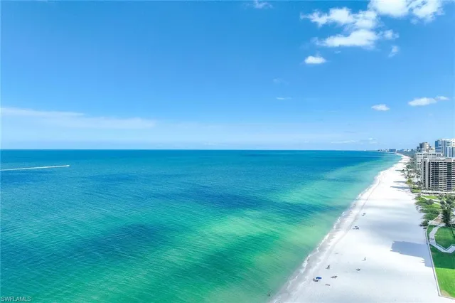 a view of an ocean with a big yard