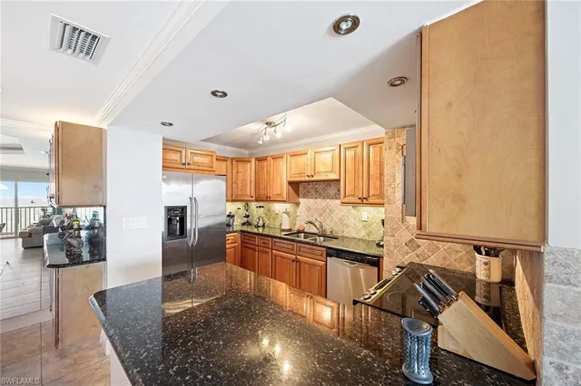 a kitchen with granite countertop lots of counter top space