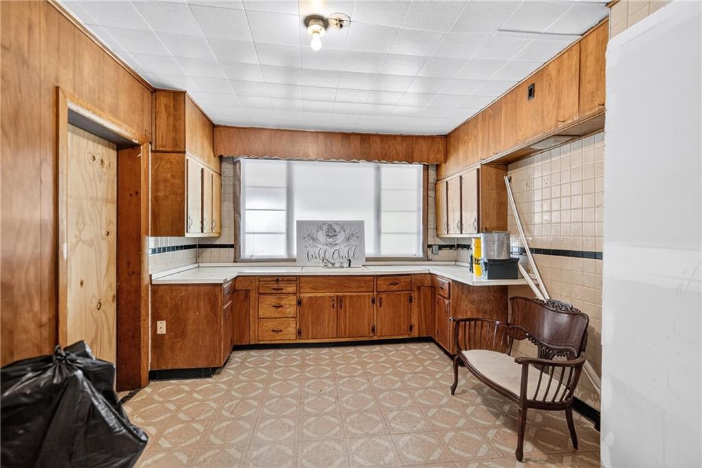 320 West Main Street Mount Pleasant, PA 15666 - Photo 28 of 37 a large bedroom with a large window and furniture