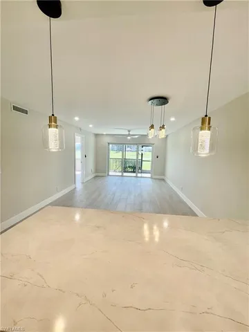 $489,000 | 9 High Point Circle North, Unit 108, Naples, FL 34103