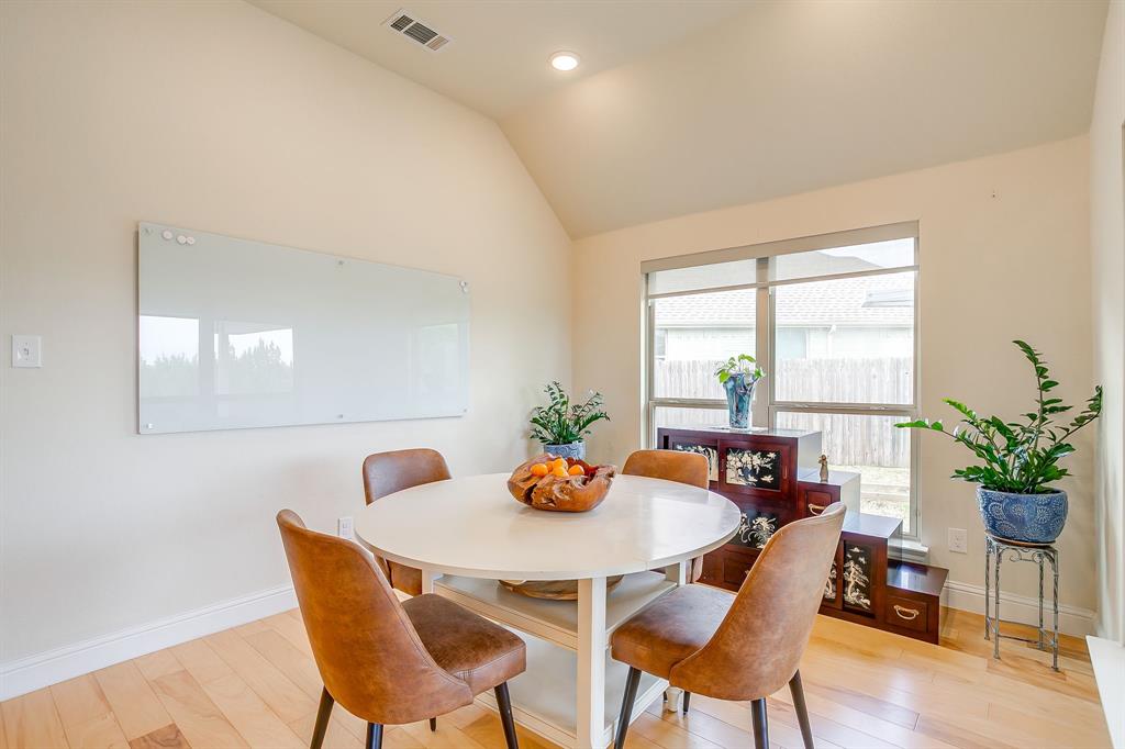 416 Bluffside Trail Benbrook, TX 76126 - Photo 18 of 40 a dining room with furniture and window