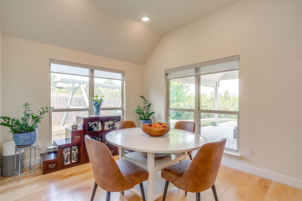416 Bluffside Trail Benbrook, TX 76126 - Photo 19 of 40 a view of a dining room with furniture window and outside view