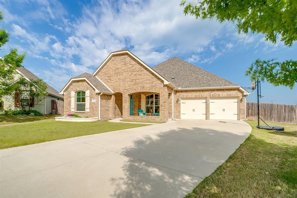 416 Bluffside Trail Benbrook, TX 76126 - Photo 2 of 40 a view of a house with a yard and pathway