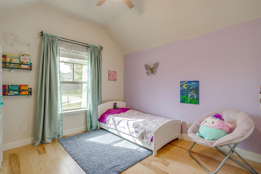 416 Bluffside Trail Benbrook, TX 76126 - Photo 26 of 40 a bedroom with a bed and a window