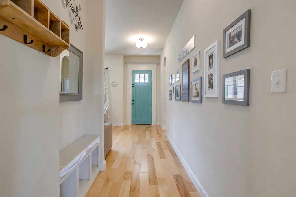 416 Bluffside Trail Benbrook, TX 76126 - Photo 6 of 40 a view of a hallway with a white walls