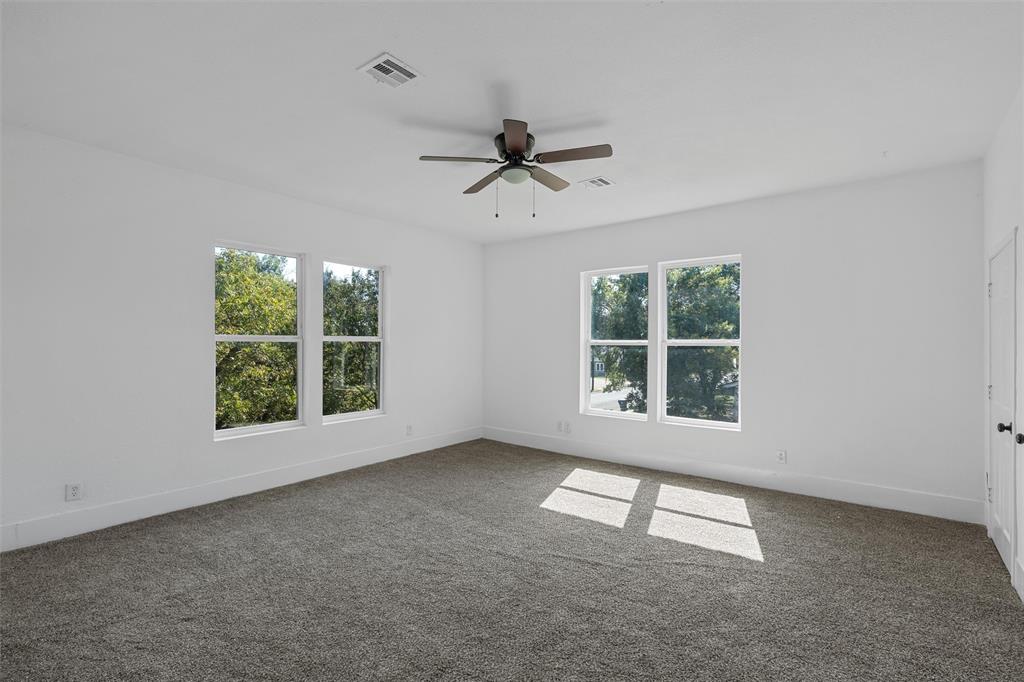 1825 Lyle Avenue Waco, TX 76708 - Photo 15 of 26 a view of an empty room with a window