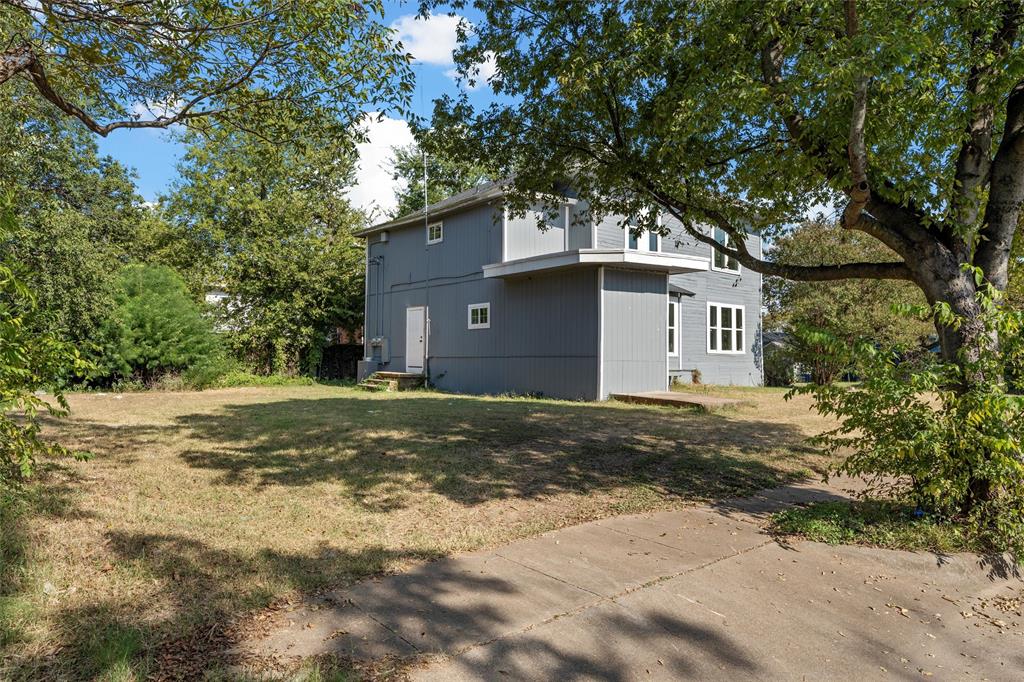 1825 Lyle Avenue Waco, TX 76708 - Photo 25 of 26 a view of a house with a yard