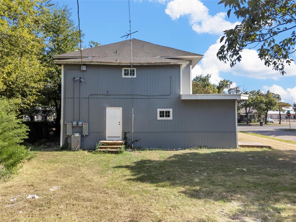 1825 Lyle Avenue Waco, TX 76708 - Photo 26 of 26 a front view of a house with a yard