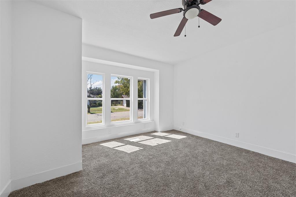 1825 Lyle Avenue Waco, TX 76708 - Photo 5 of 26 a view of an empty room with a window