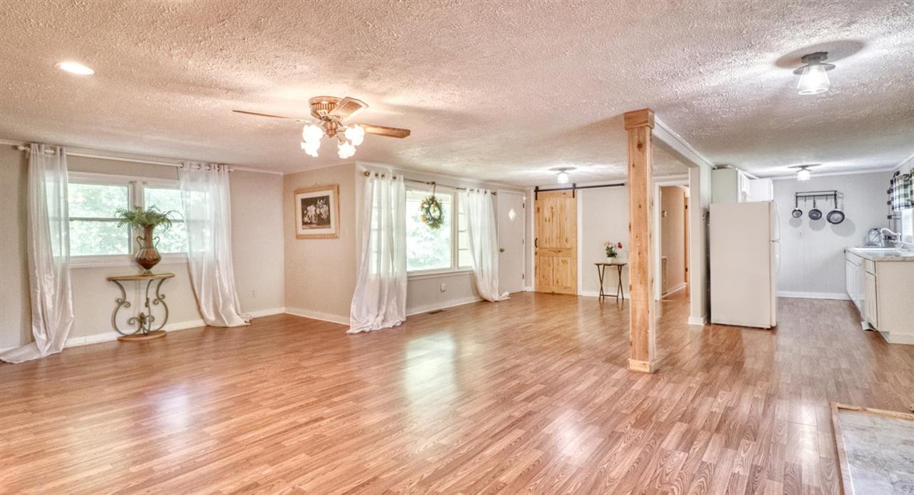 123 Lohrig Road Jackson, TN 38301 - Photo 7 of 24 a view of a livingroom with wooden floor