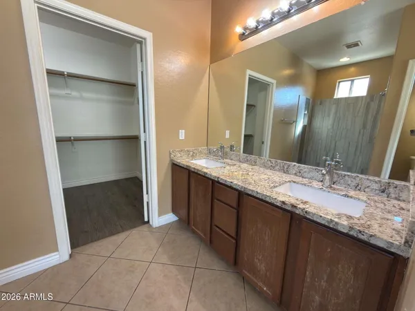 a view of an empty walk in closet