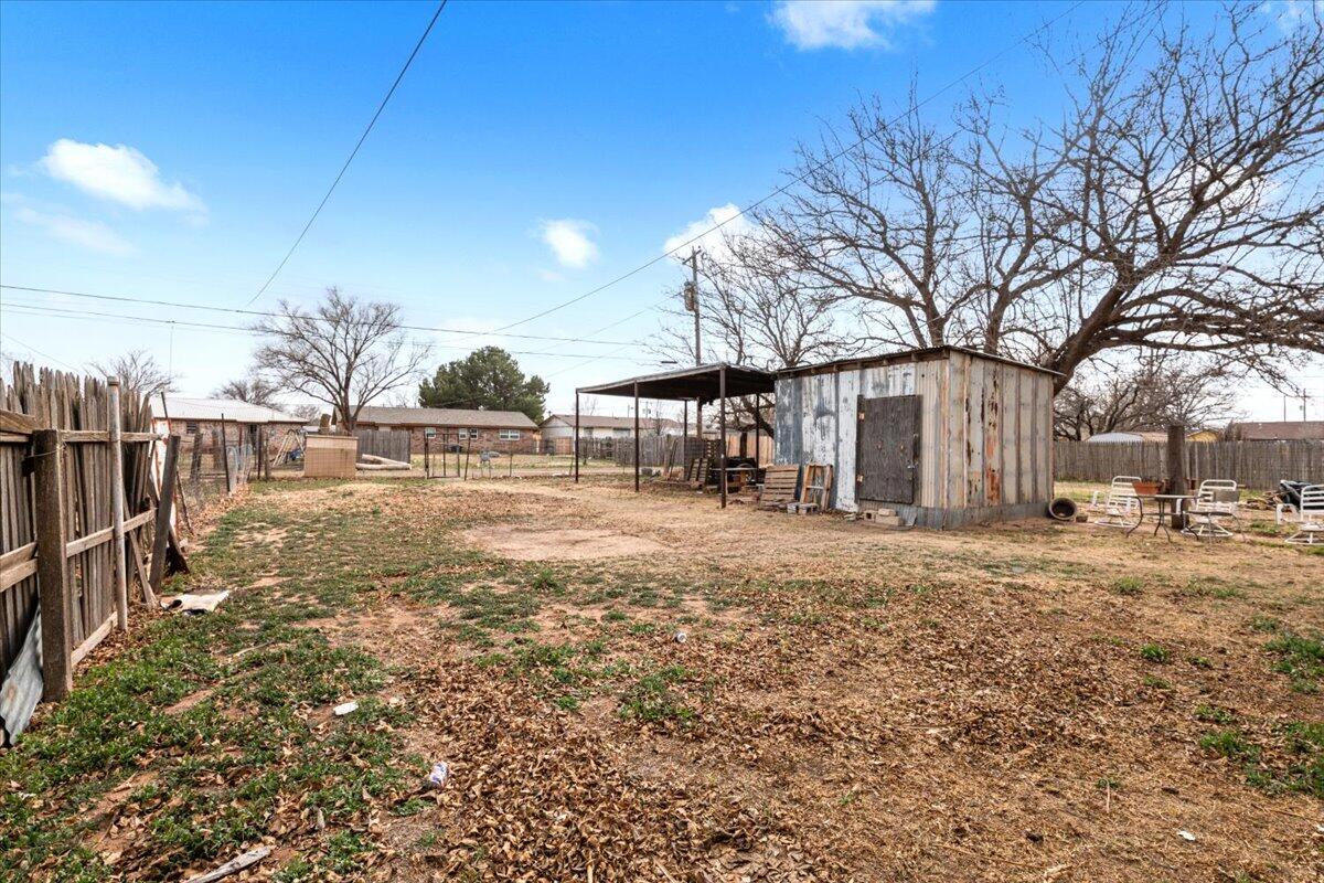 1316 West 6th Street Littlefield, TX 79339 - Photo 18 of 19 a view of a yard with a house