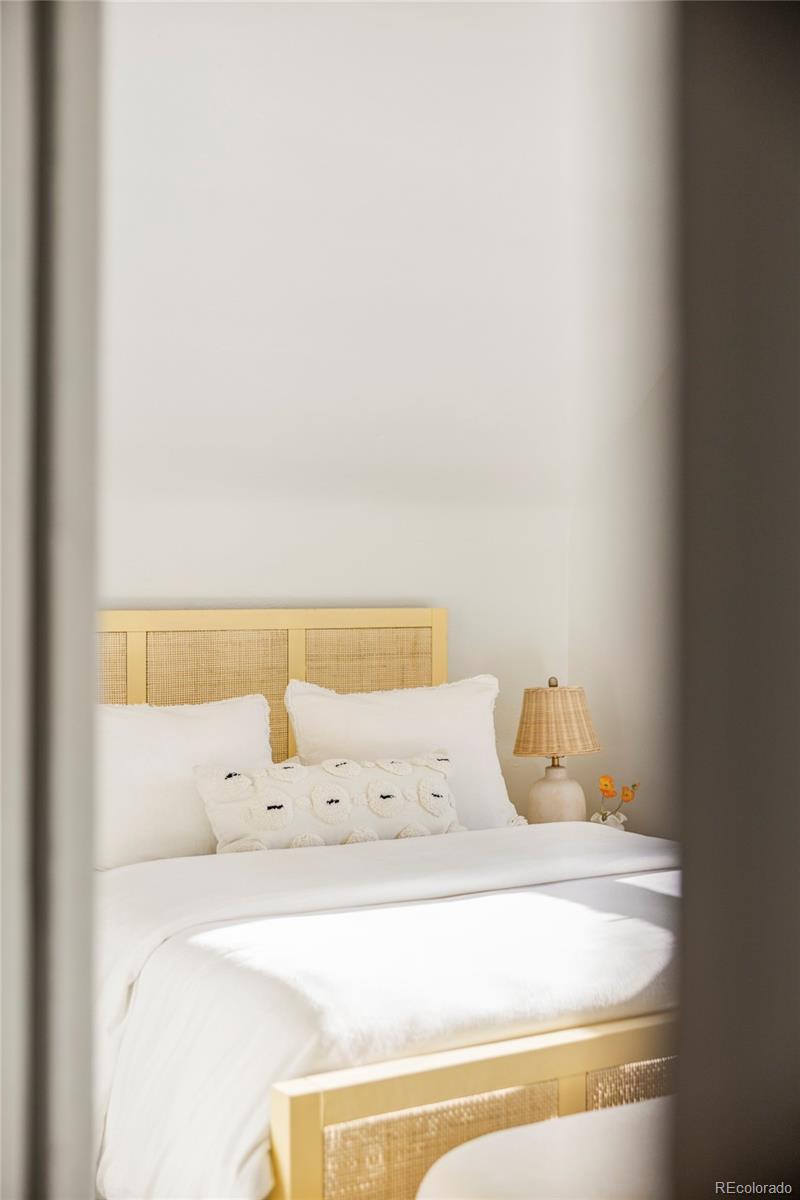 142 Logan Street Denver, CO 80203 - Photo 13 of 32 a bathroom with a bathtub