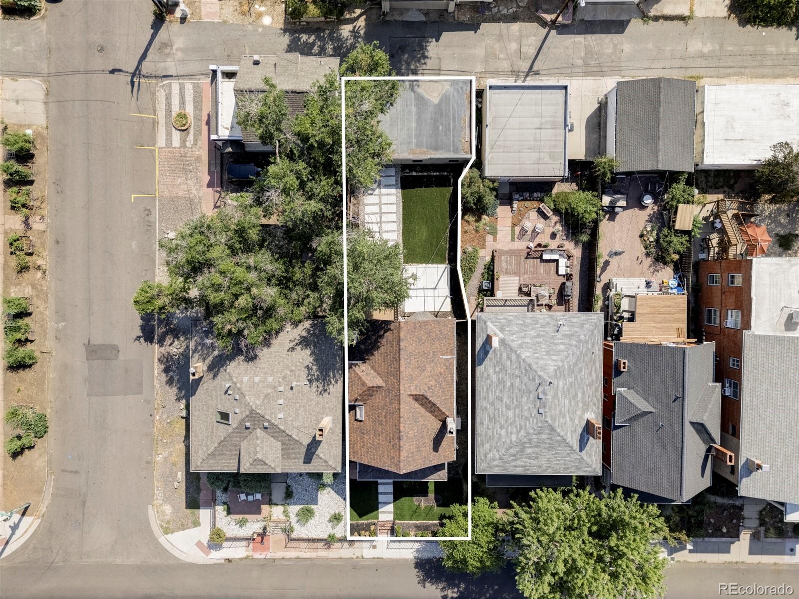 142 Logan Street Denver, CO 80203 - Photo 31 of 32 an aerial view of residential houses with outdoor space