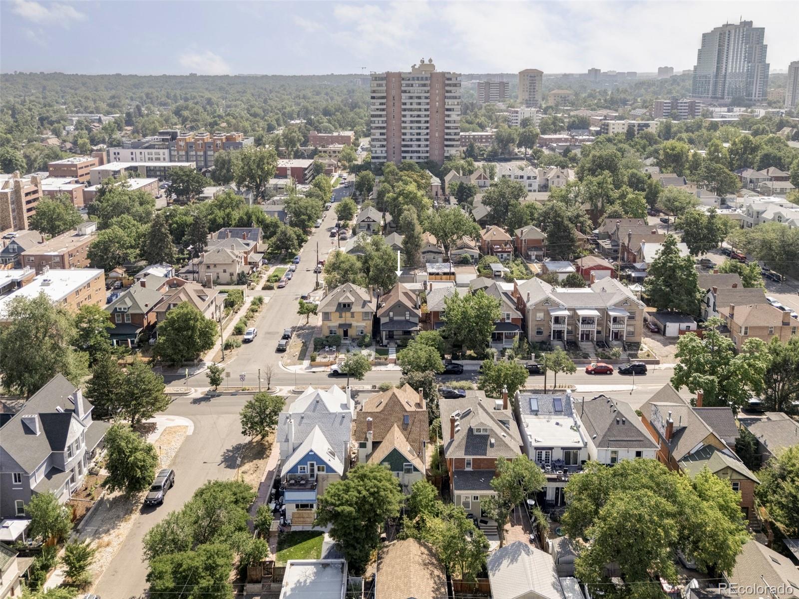 142 Logan Street Denver, CO 80203 - Photo 32 of 32 an aerial view of residential houses with city view