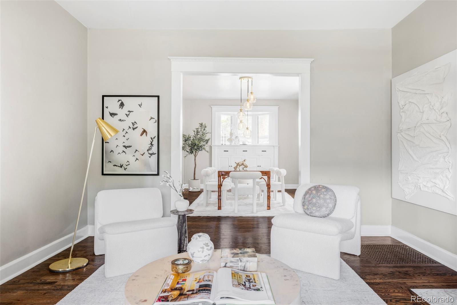 142 Logan Street Denver, CO 80203 - Photo 6 of 32 a living room with furniture and wooden floor