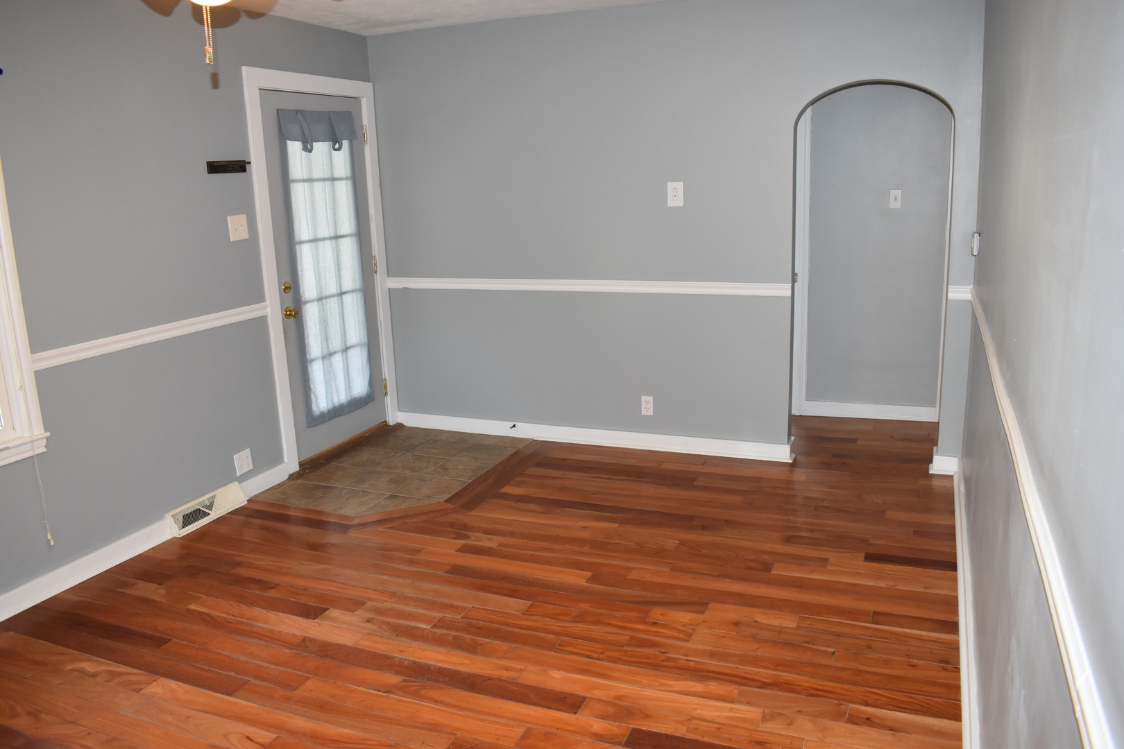 806 East Washington Street Pontiac, IL 61764 - Photo 6 of 12 an empty room with wooden floor and closet