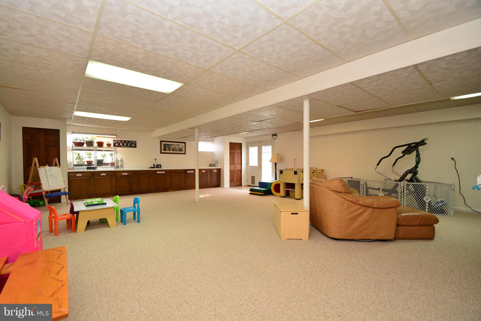 1502 Rolling Road Bel Air, MD 21014 - Photo 27 of 30 Basement with lots of storage cabinets