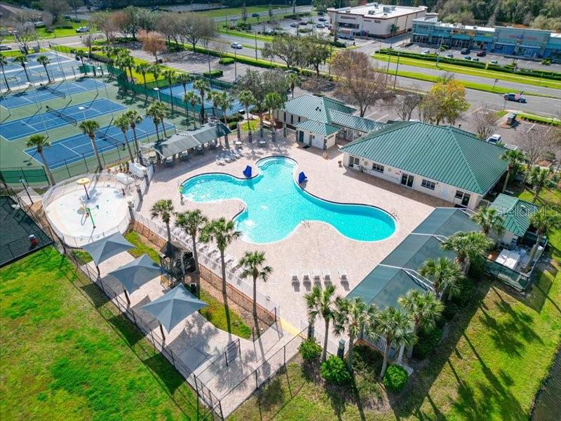 29924 Playa Del Rey Lane Wesley Chapel, FL 33543 - Photo 26 of 31 an aerial view of a swimming pool and outdoor space