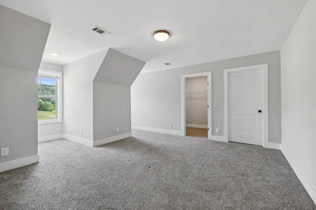 a view of a room with racks on the wall