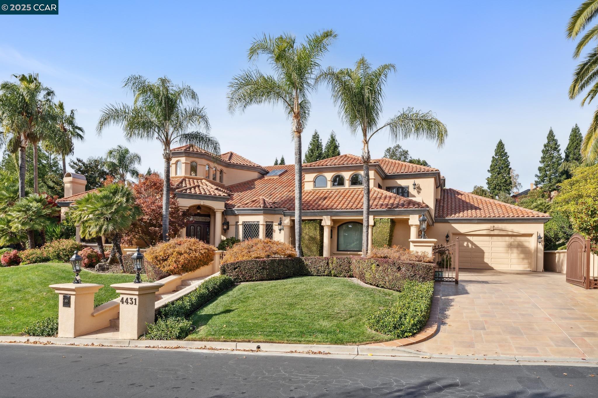 4431 Deer Ridge Road Danville, CA 94506 - Photo 1 of 1 a front view of a house with a garden and trees