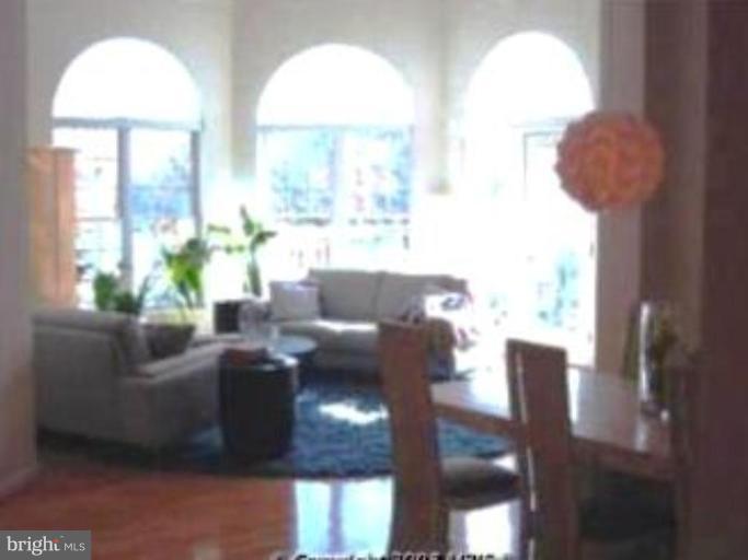 731 Runabout Loop, Unit 731 Solomons, MD 20688 - Photo 22 of 27 Living Room/Dining Room