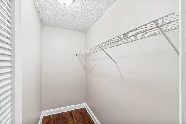 a view of a room with racks on the wall