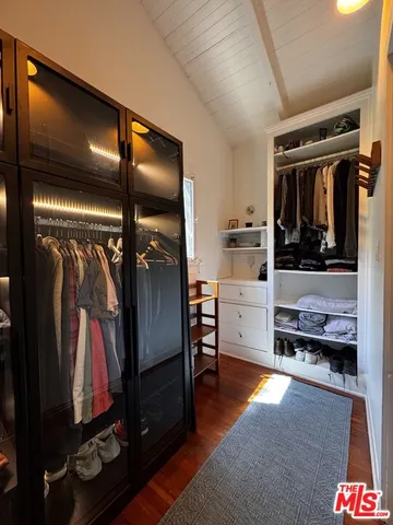 a view of a hallway with seating area