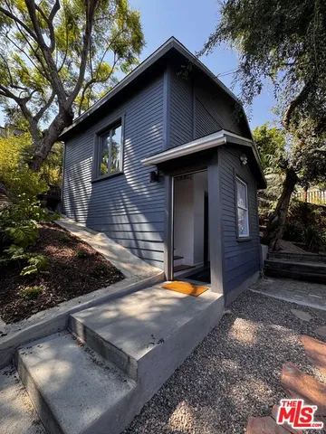 a backyard of a house with yard