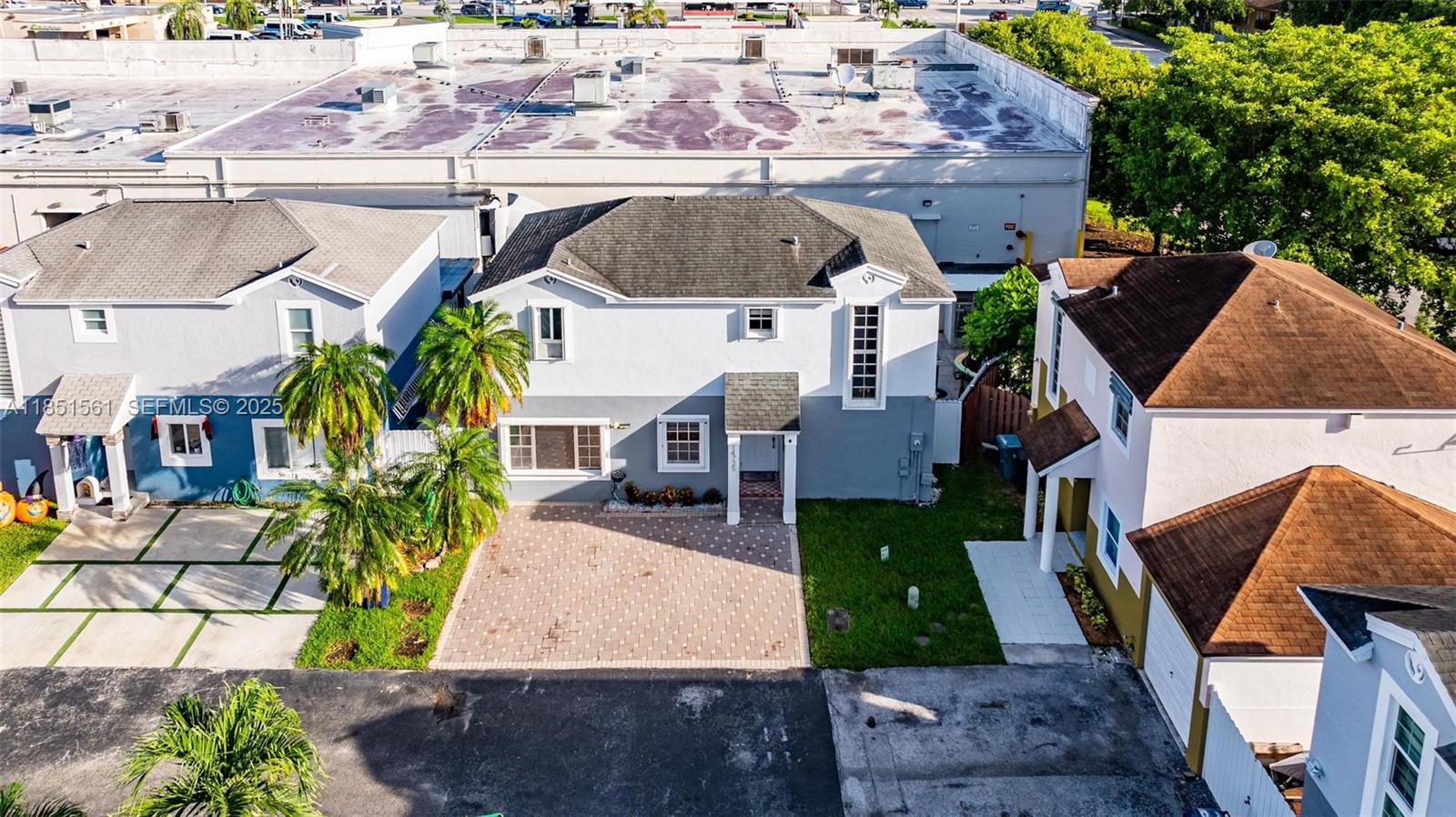 14725 Southwest 90th Terrace Miami, FL 33196 - Photo 4 of 50 an aerial view of a house with garden space and sitting area