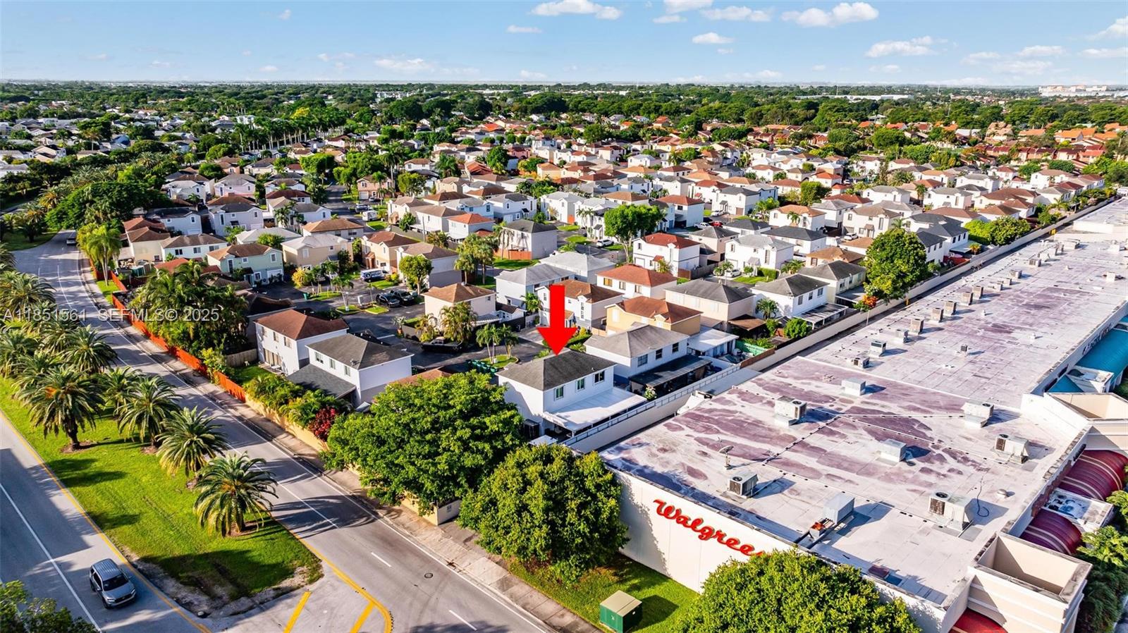 14725 Southwest 90th Terrace Miami, FL 33196 - Photo 44 of 50 an aerial view of residential houses with outdoor space and trees