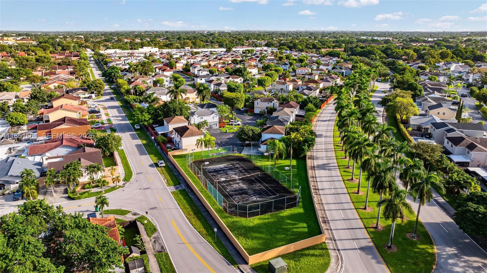 14725 Southwest 90th Terrace Miami, FL 33196 - Photo 47 of 50 an aerial view of residential houses with yard
