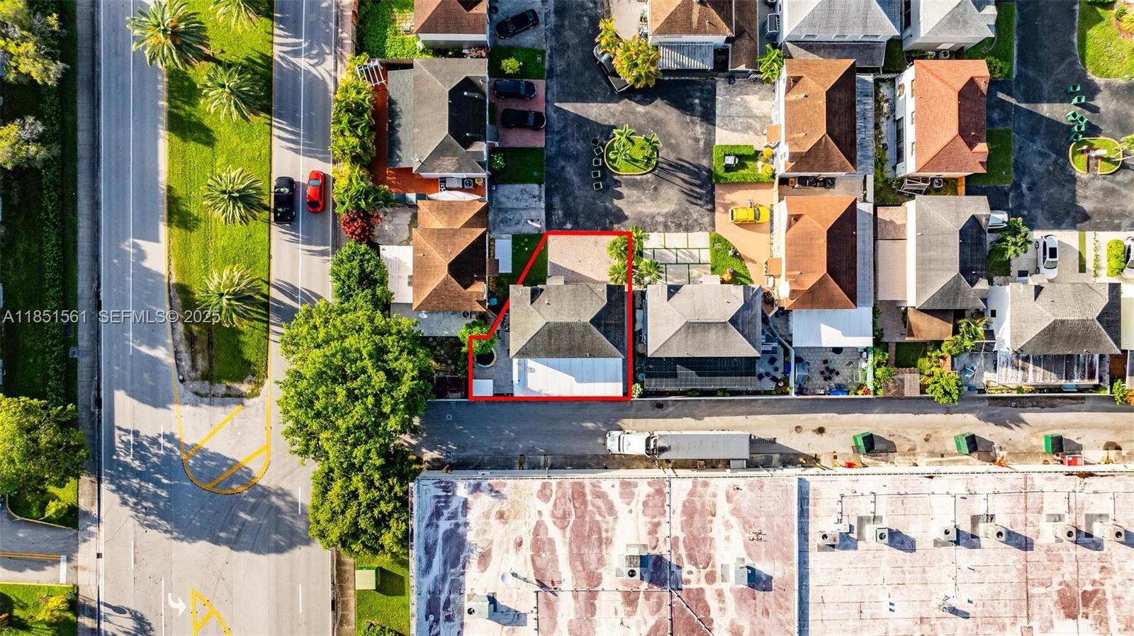 14725 Southwest 90th Terrace Miami, FL 33196 - Photo 8 of 50 an aerial view of multi story residential apartment building with yard and retail shops