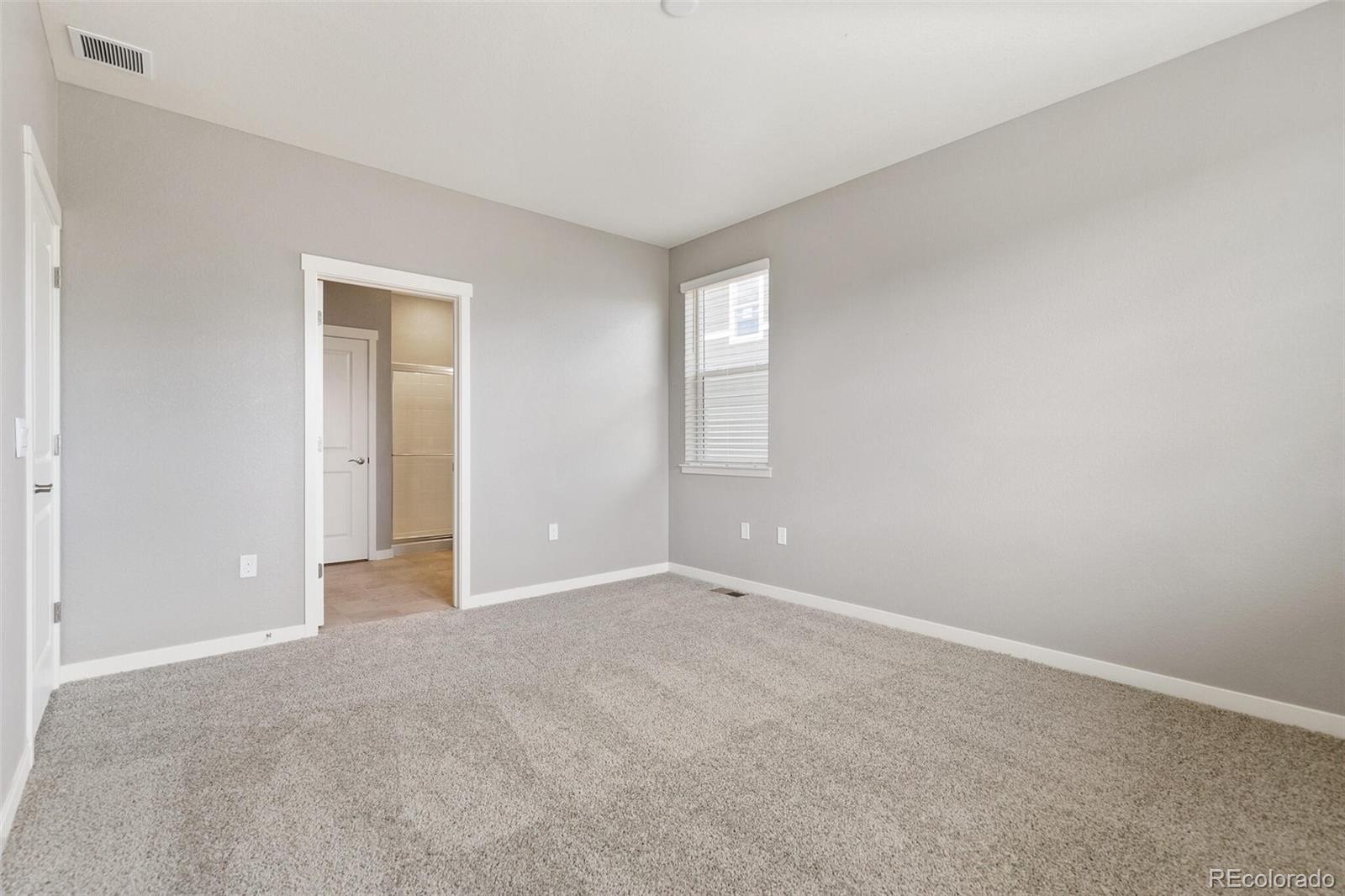 3458 Belleville Ridge Road Elizabeth, CO 80107 - Photo 18 of 27 a view of an empty room with window and closet area
