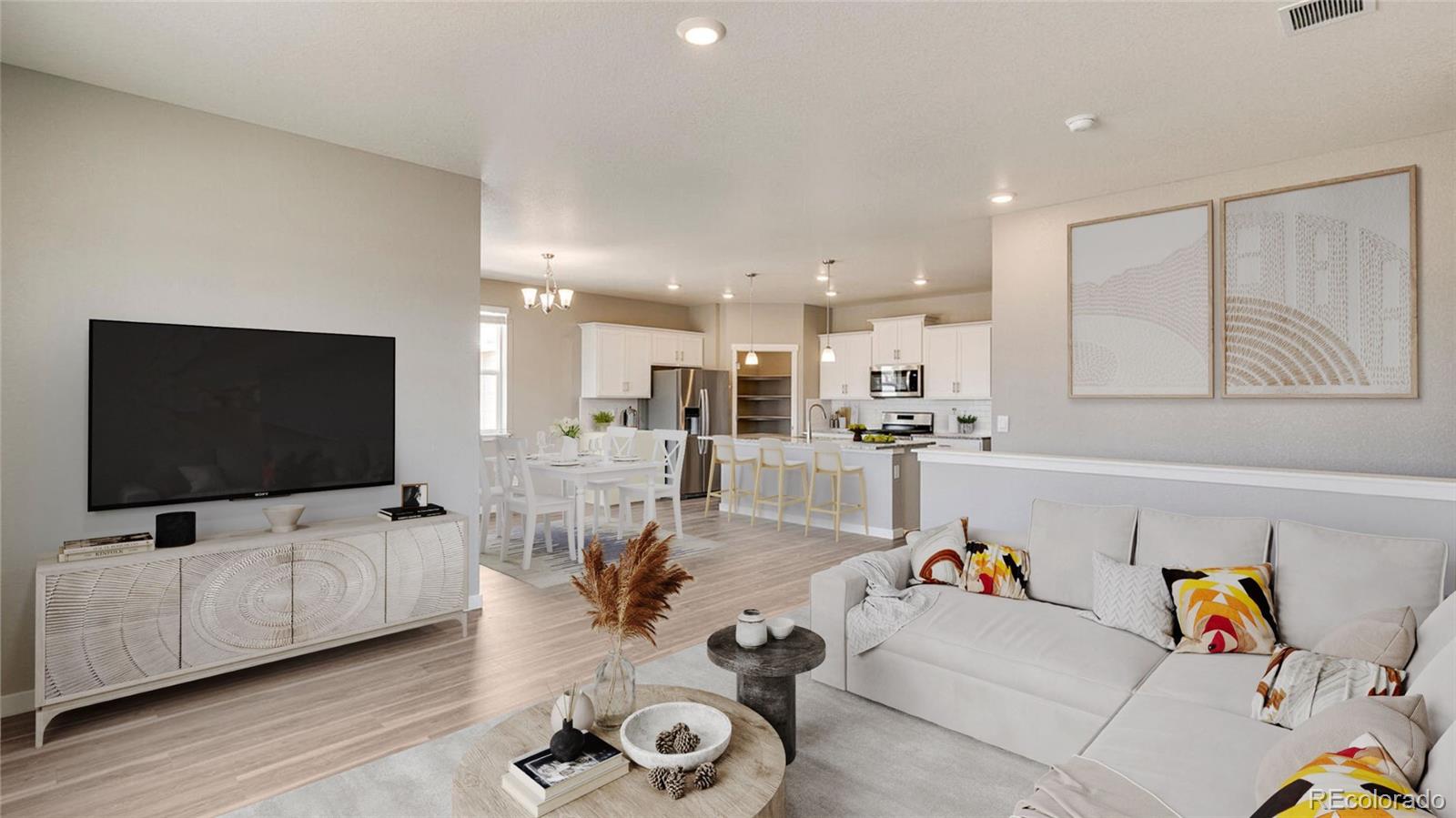 3458 Belleville Ridge Road Elizabeth, CO 80107 - Photo 4 of 27 a living room with furniture and a flat screen tv