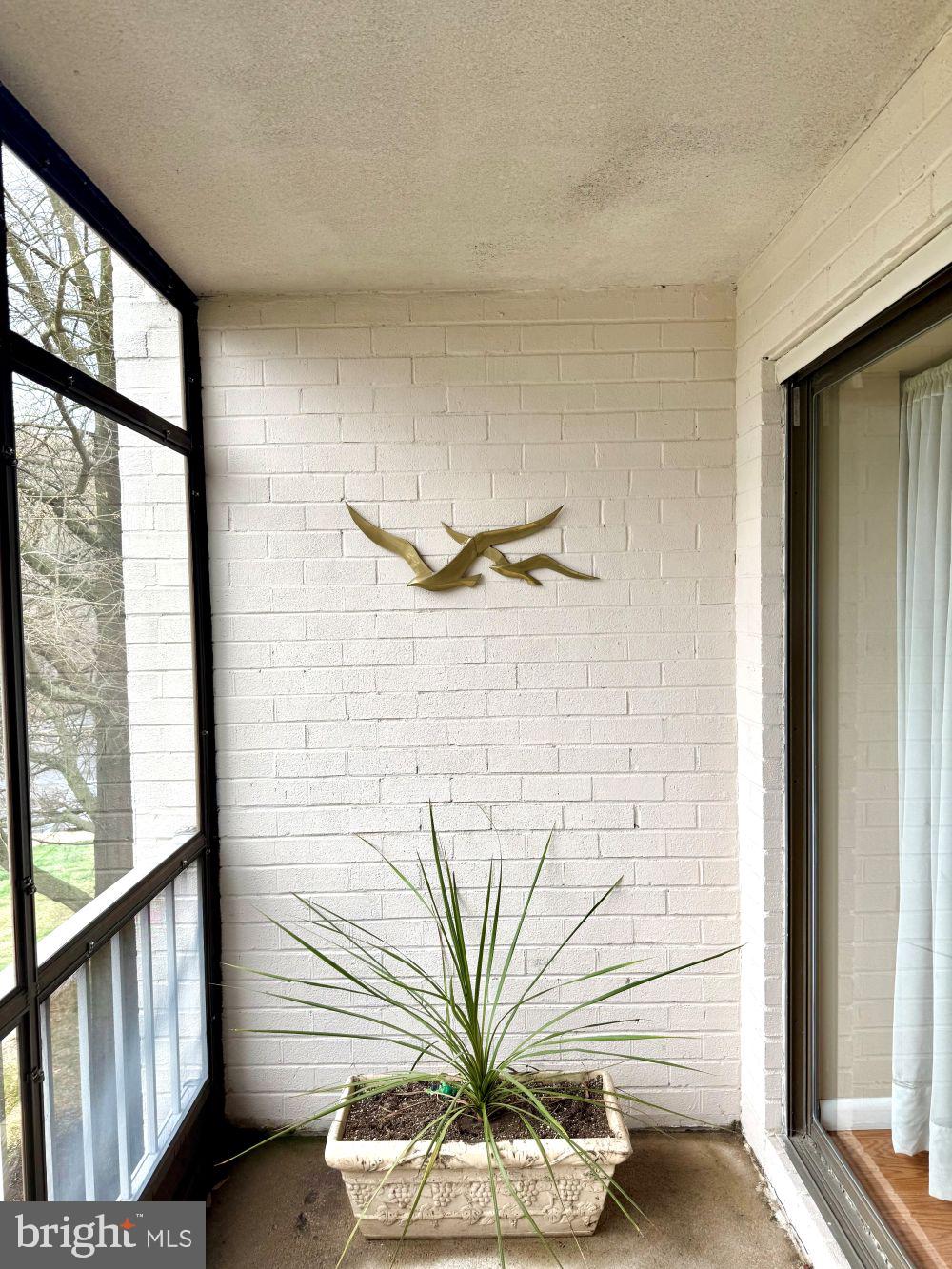80 Welsh Tract Road, Unit G306 Newark, DE 19713 - Photo 11 of 11 a view of a glass door and window in a room