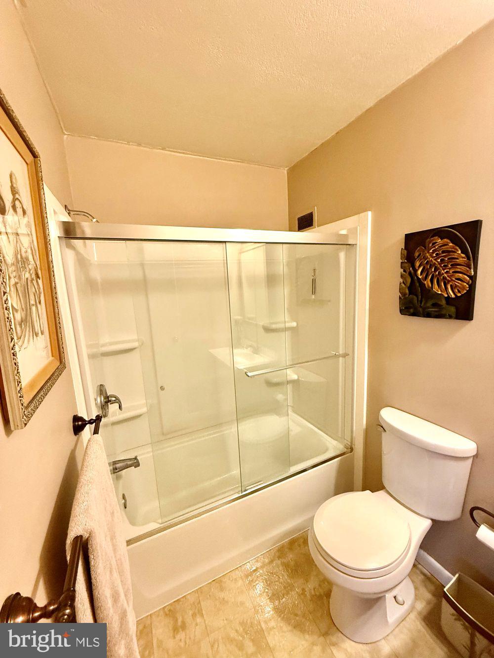 80 Welsh Tract Road, Unit G306 Newark, DE 19713 - Photo 10 of 11 a bathroom with a toilet and a shower