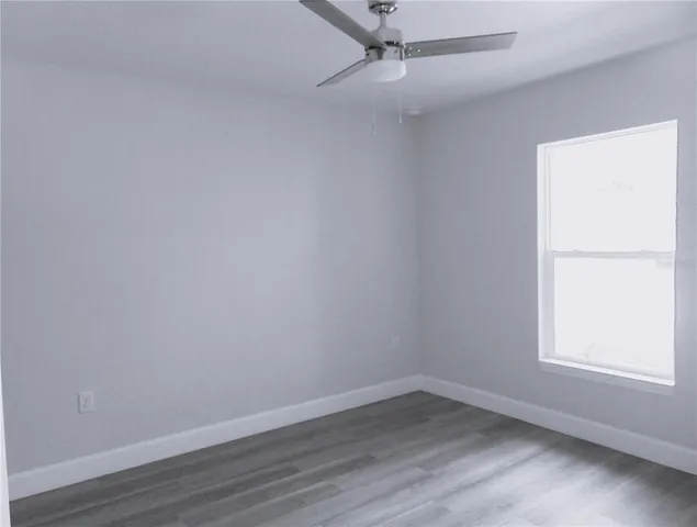 a bathroom with a toilet a sink and shower