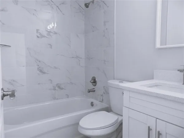 a bathroom with a sink and a toilet