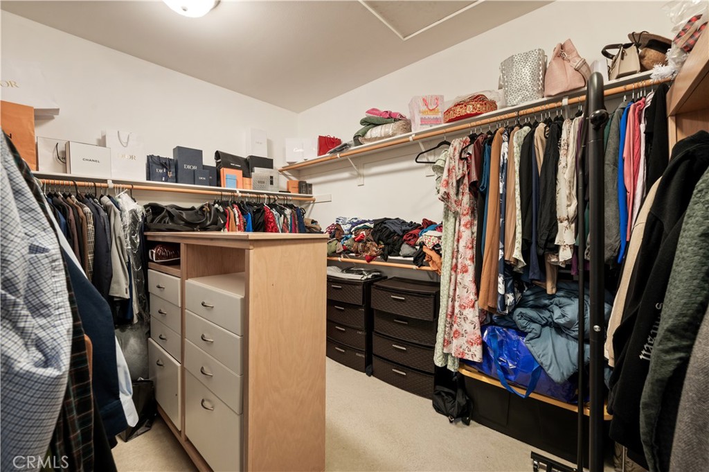 5588 California Oak Street Simi Valley, CA 93063 - Photo 45 of 75 a view of walk in closet with clothes and shoes