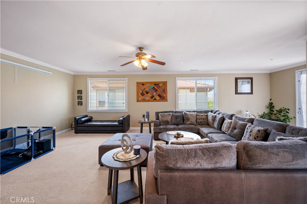 5588 California Oak Street Simi Valley, CA 93063 - Photo 56 of 75 a living room with furniture and a window