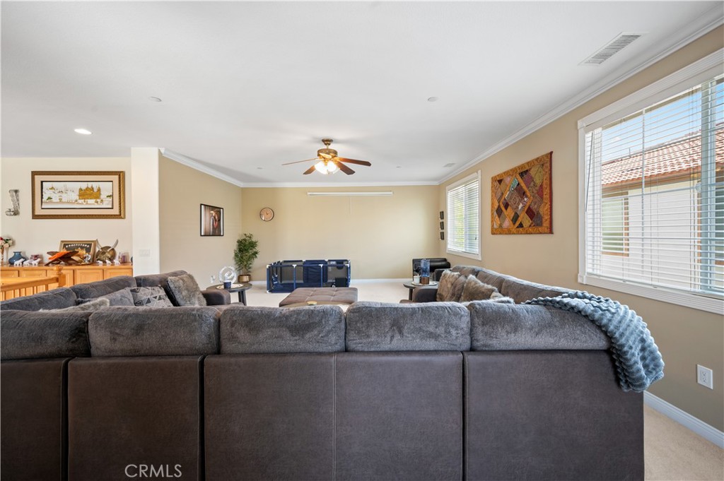5588 California Oak Street Simi Valley, CA 93063 - Photo 58 of 75 a living room with furniture and a window