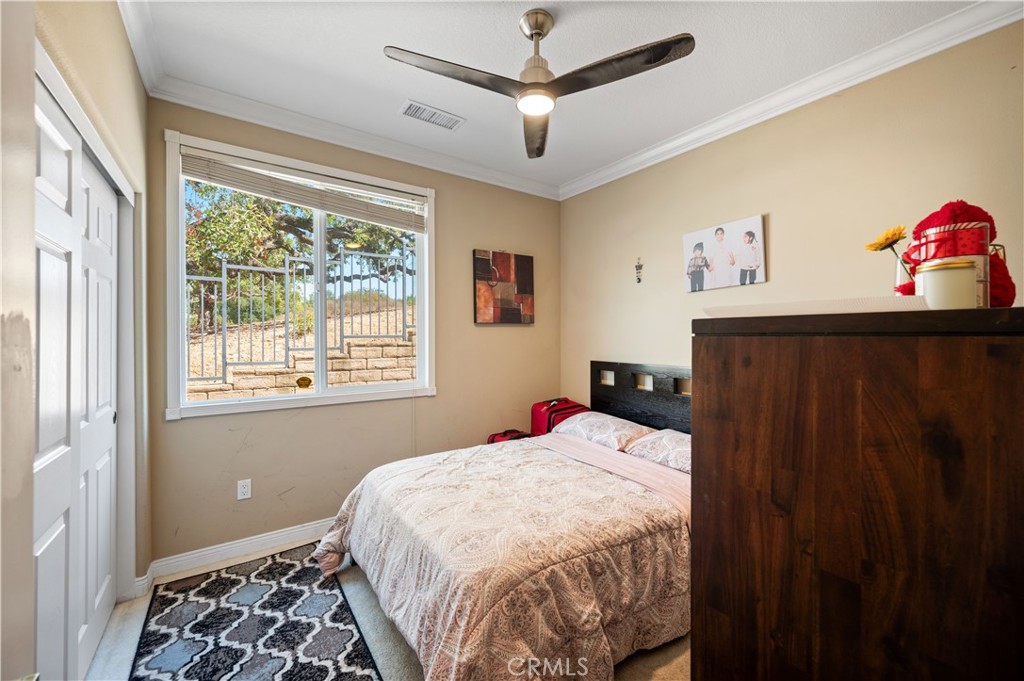 5588 California Oak Street Simi Valley, CA 93063 - Photo 63 of 75 a bedroom with a bed and a window