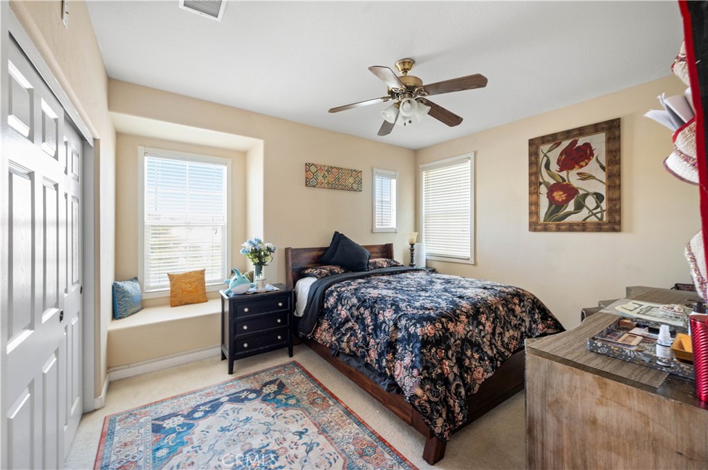 5588 California Oak Street Simi Valley, CA 93063 - Photo 9 of 75 a bed room with a bed and a chandelier