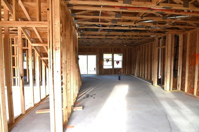 a view of outdoor space with wooden floor and chair