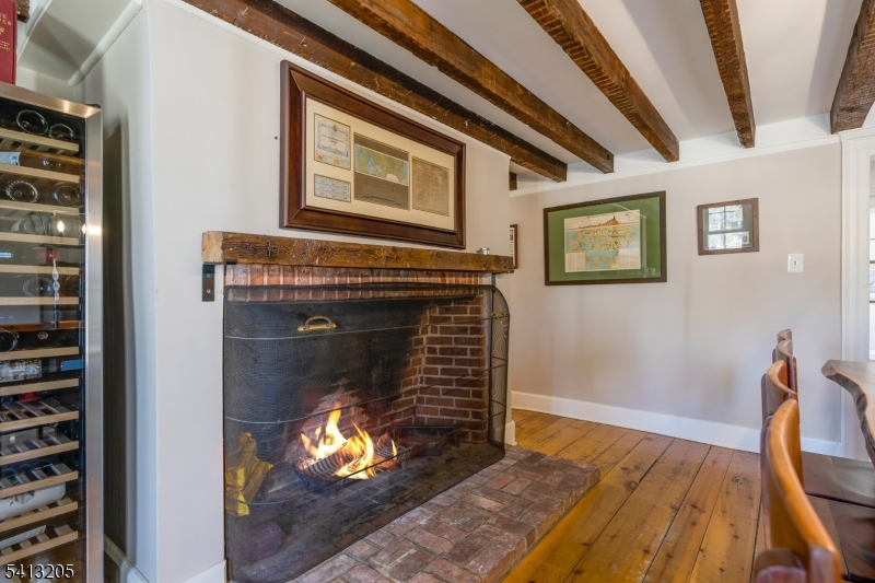 962 Old York Road Neshanic Station, NJ 08853 - Photo 11 of 33 a living room with furniture and a fireplace