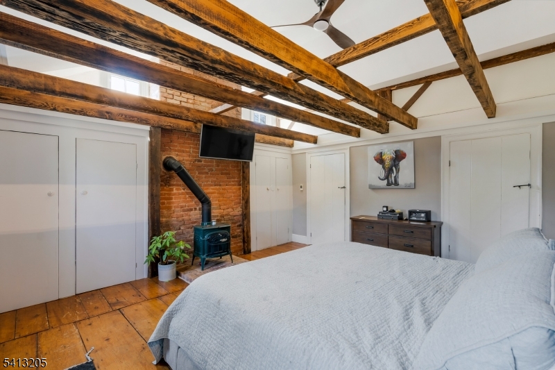 962 Old York Road Neshanic Station, NJ 08853 - Photo 18 of 33 a bedroom with a bed and a large window