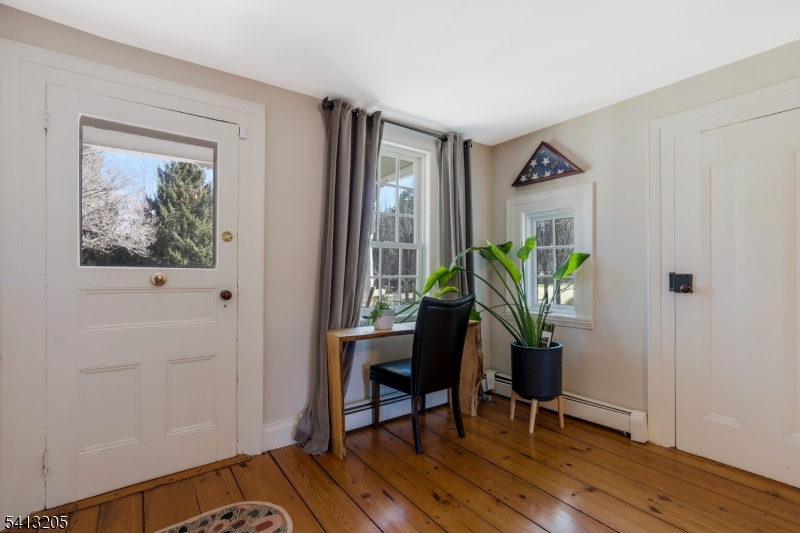 962 Old York Road Neshanic Station, NJ 08853 - Photo 3 of 33 a workspace room with furniture and wooden floor
