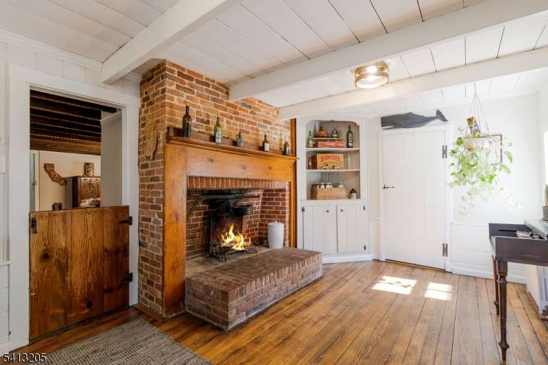 962 Old York Road Neshanic Station, NJ 08853 - Photo 6 of 33 a living room with furniture and a fireplace